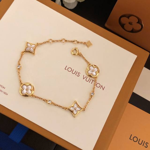 A finely crafted version of Louis Vuitton's latest Blooming Lv Four-Flower Brac