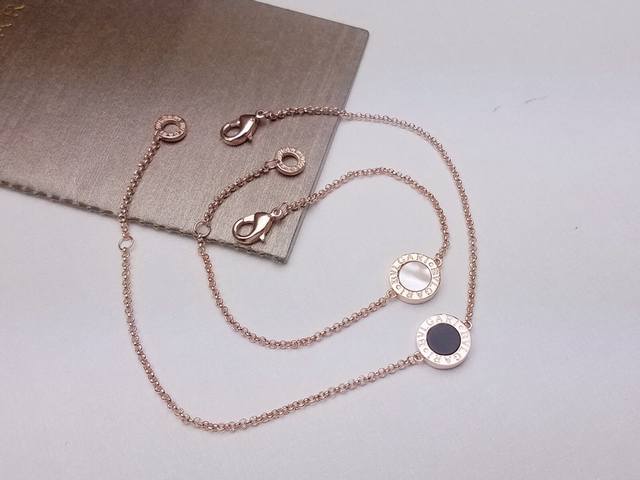 Bracelet and anklet Bvlgari classic black and white double-sided round bracelet
