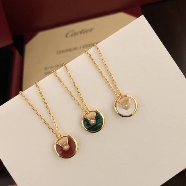 Exclusive Cartier Amulet Necklace in stock. "Amulette" means "amulet" in French