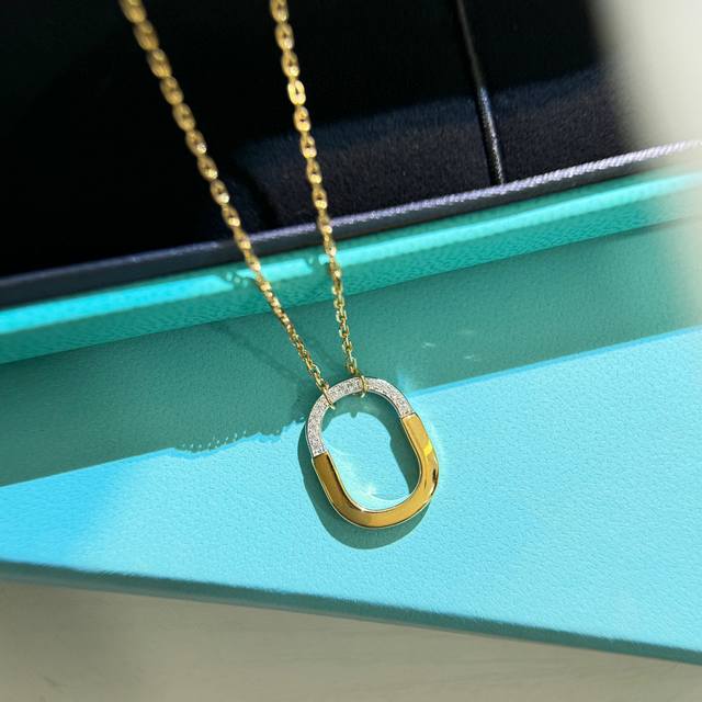 Tiffany & Co.'s new hot new mini U-shaped lock half diamond two-tone necklace is