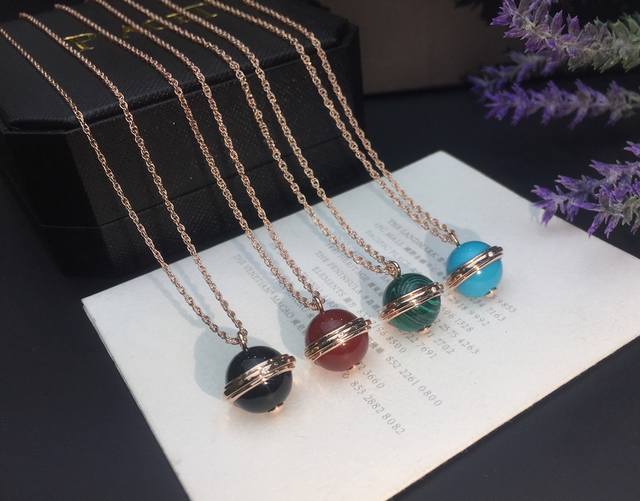 Ossession Earl necklace paired with black agate, carnelian, malachite and turquo