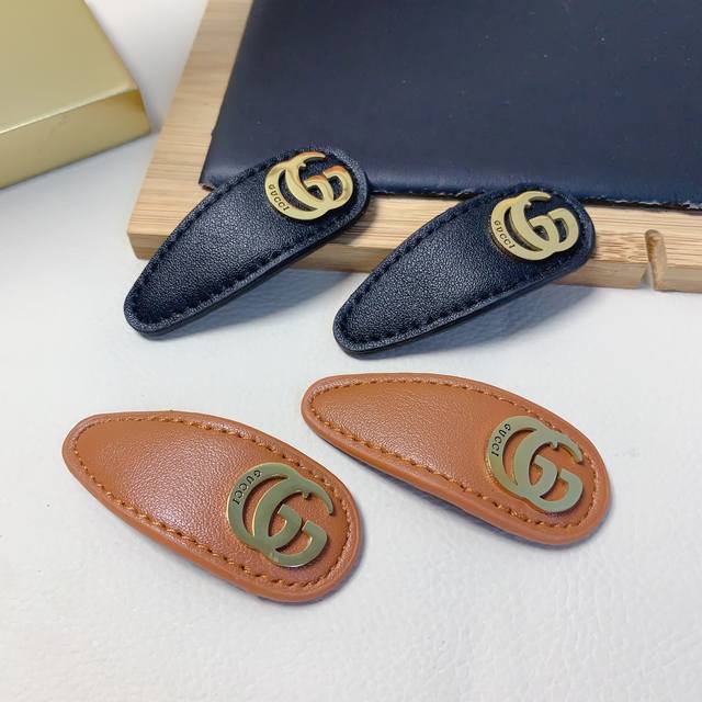 Gucci Gucci hair clip leather titanium steel logo press clip Bb clip side clip d