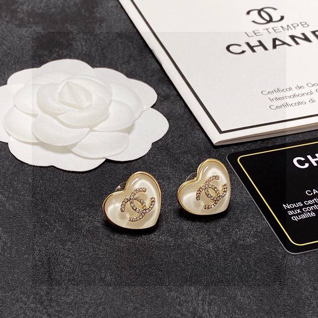 Chanel Classic Heart Double C Earrings. These earrings are a versatile and styli