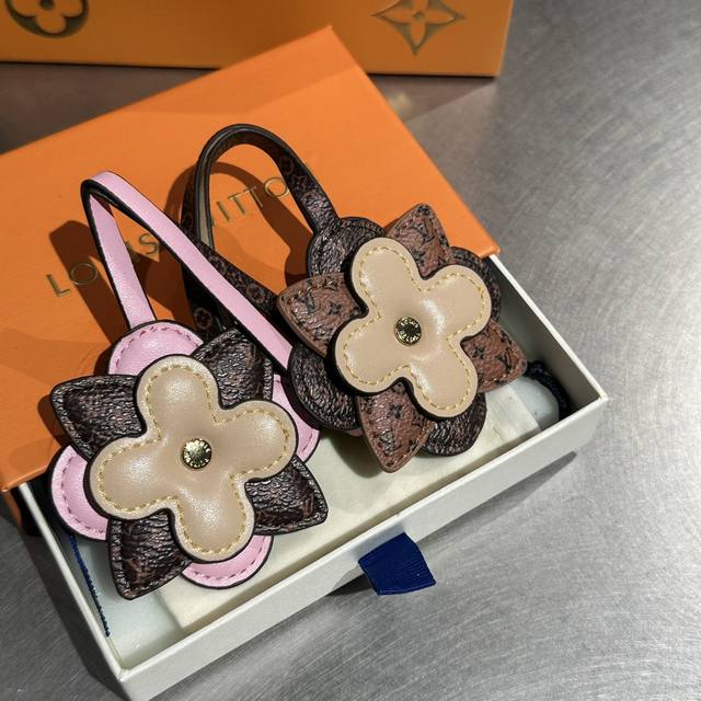 My Monogram Layers bag charm combines Monogram canvas and fine cowhide leather,