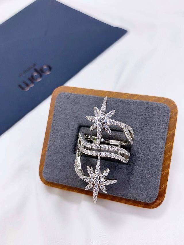 Apm Monaco Double Star Ring! Inspired by the starry sky, it evokes a shimmering