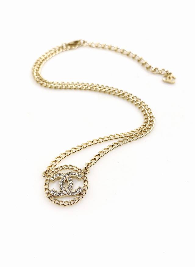 Chanel's latest hollow round necklace is made of brass in batch Z.