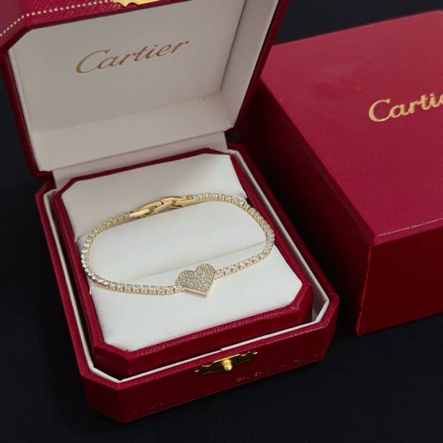 Cartier's high-end custom diamond-encrusted heart bracelet features a classic ye