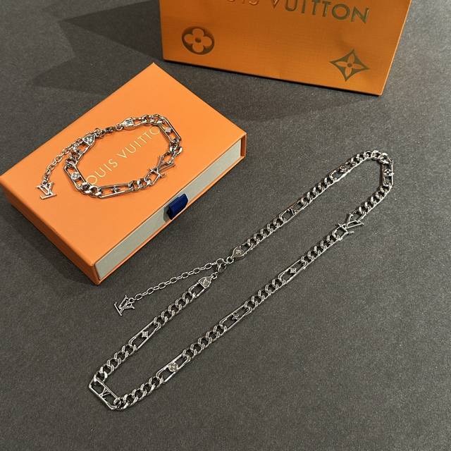 Bracelet, Necklace - Lv Figaro Necklace features dazzling brass links, subtly e
