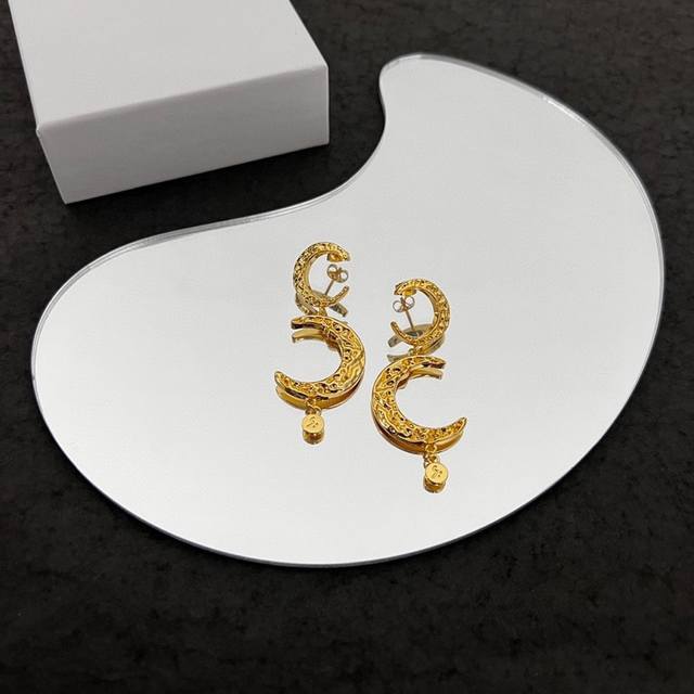 Wens | Double moon long earrings are elegant and exquisitely designed, fashionab