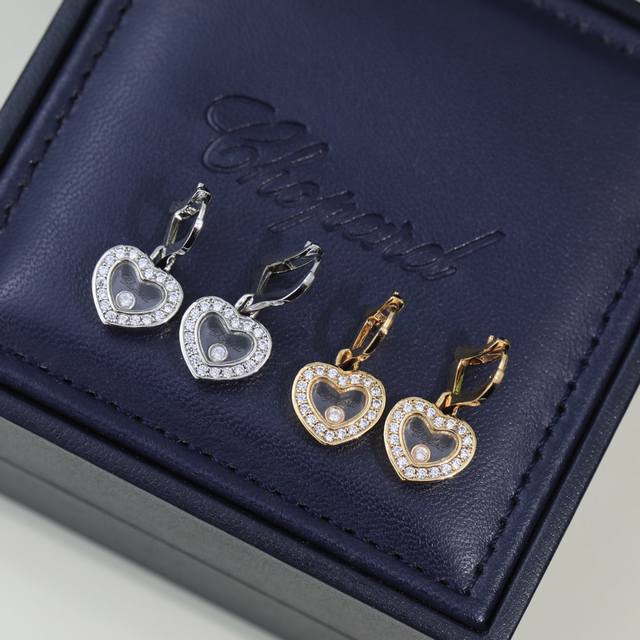 Chopard High-end Chopard earrings with diamonds encased in glass perfectly blend