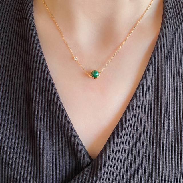 V Gold, Red Agate, and Peacock Green Piaget Rotating Ball Necklace. Freely match