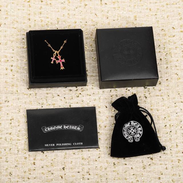 206446 We offer a double cross necklace, which can be customized with real gold
