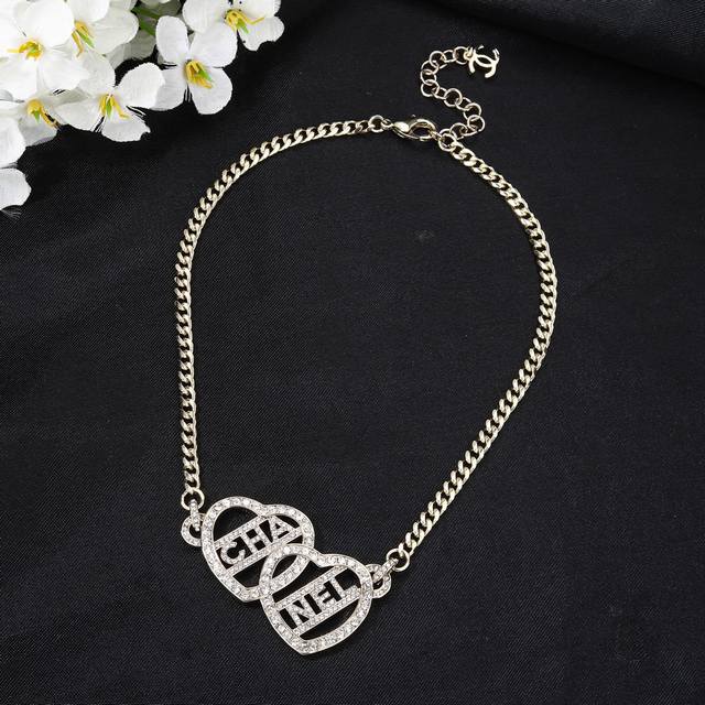 Chanel's new heart necklace is now available at the counter. The double C neckla
