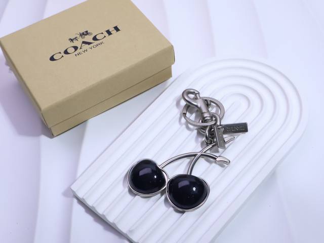 Coach cherry keychain bag charm is very cute and comes with a box. DDD