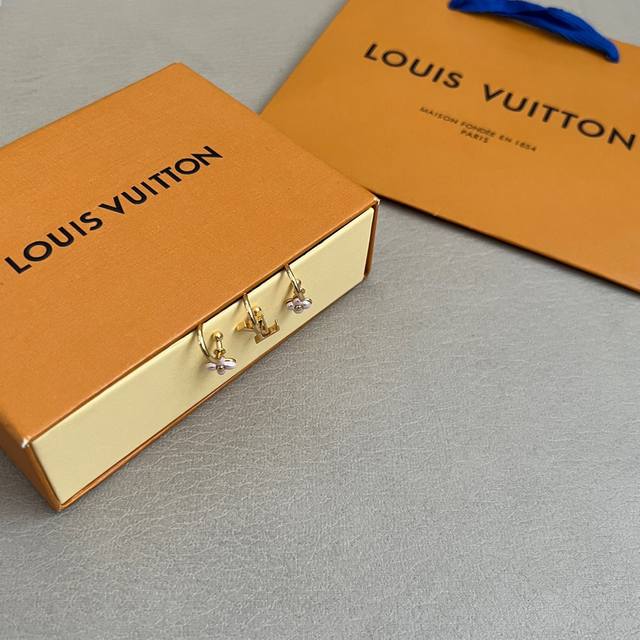 A set of 3 LV earrings from Louis Vuitton. Made of the same material as the Loui