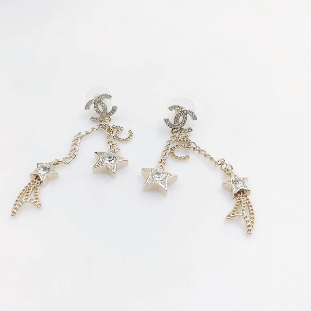 Chanel latest hollow 5-word five-pointed star 3 tassels consistent Z batch brass