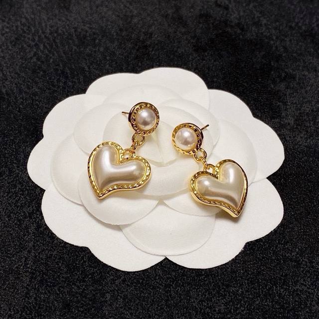 Chanel's new heart-shaped earrings may seem simple, but they are very classic an