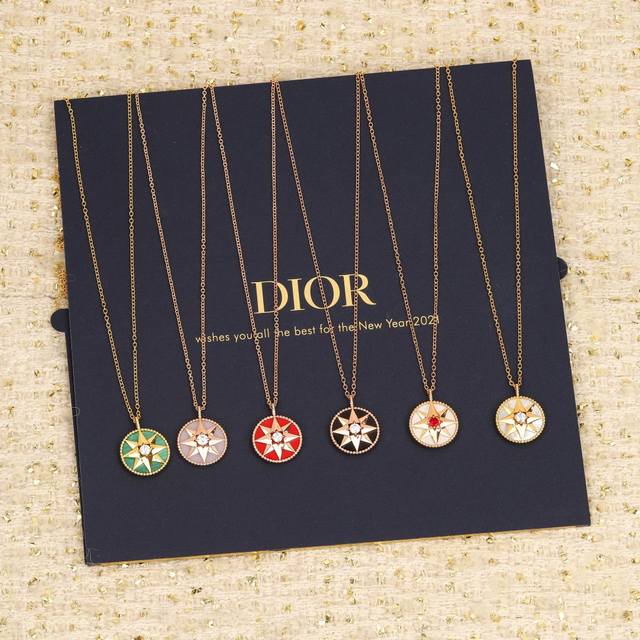 205179 Our large compass necklace, ZP 70,000, can be customized with 18K real go