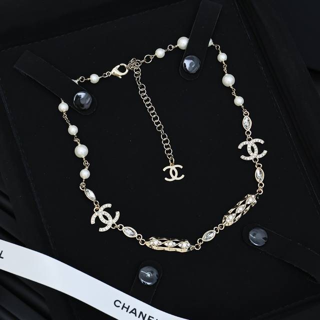 Chanel's popular wavy diamond double C necklace. Who wouldn't be confused by thi