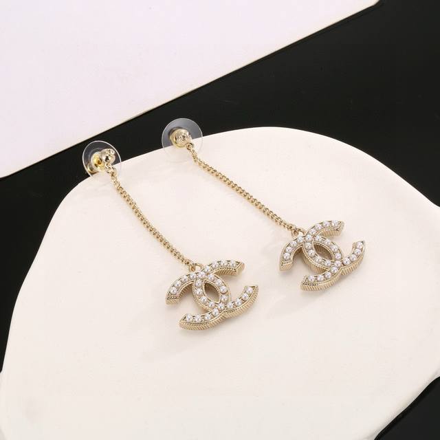 Chanel Chanel classic double C pearl long earrings are very beautiful and versat