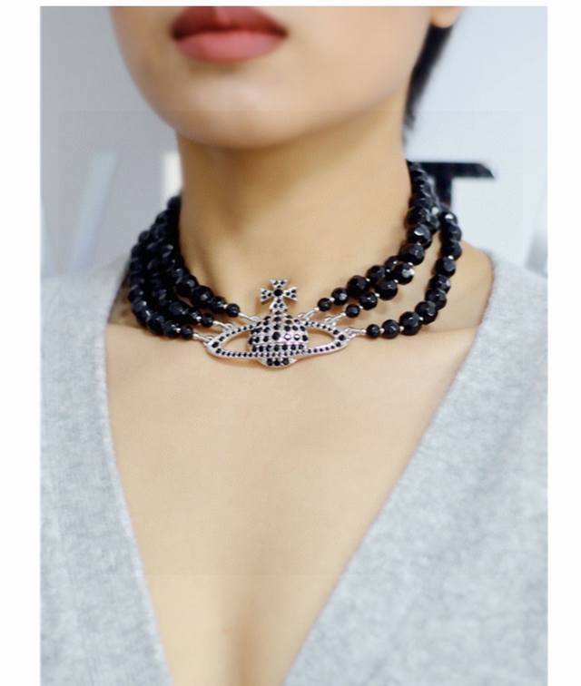 Classic Saturn crystal necklace by Vivienne Westwood! British fashion designer,