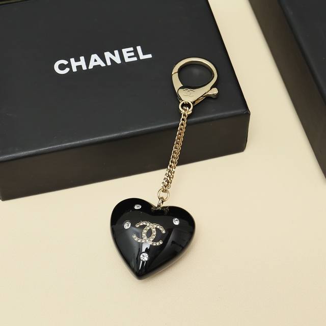 Chanel black heart keychain The double C on each side is different. It can be wo