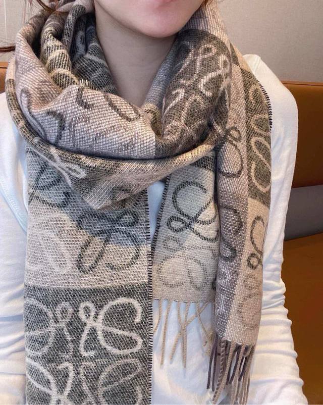 Loewe avocado-colored two-tone checkerboard long scarf. I was lucky enough to g