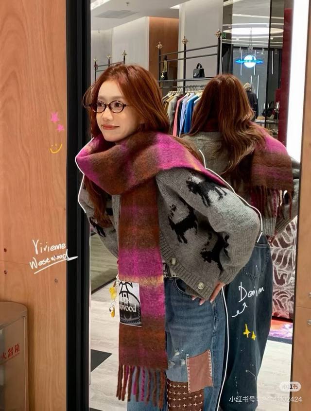 Classic large Saturn mohair scarf by Vivienne Westwood, the British fashion des