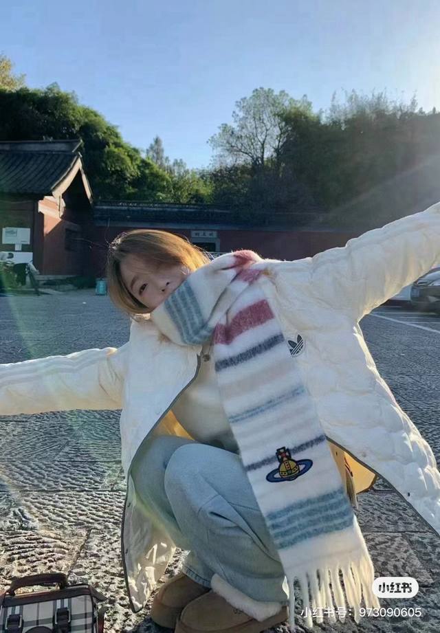 This classic mohair scarf, worn by Empress Dowager Cixi, is by the British fash