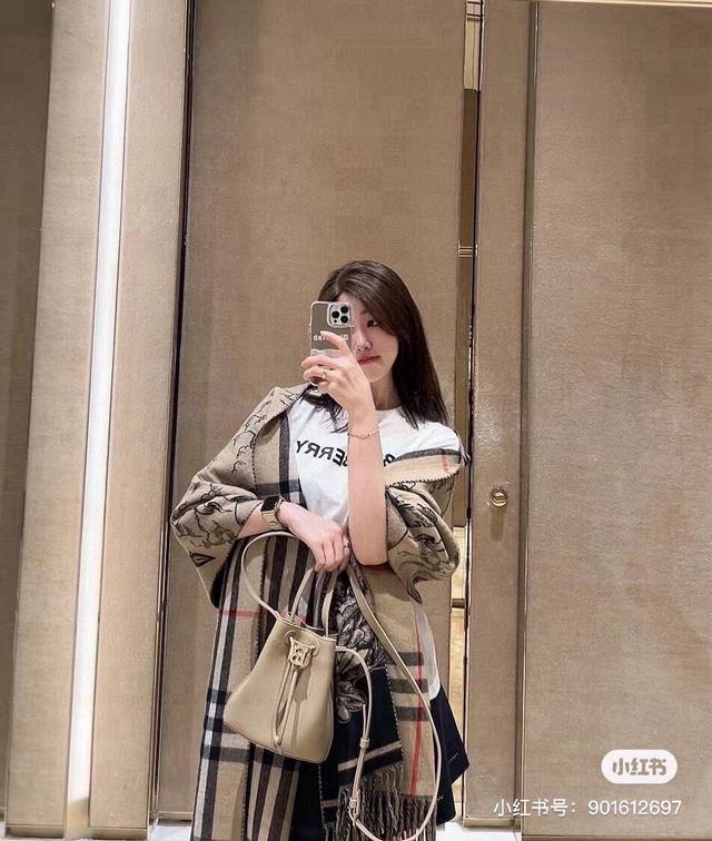 Burberry's popular Warhorse Knight reversible cape is a versatile and beautiful