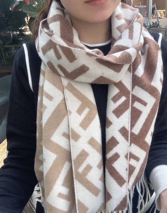 Fendi's new monogram gradient double-sided cashmere scarf features a soft and de