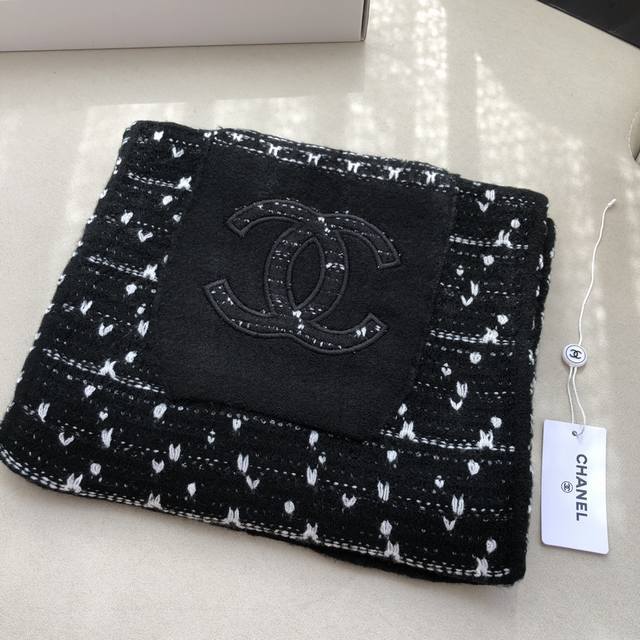 Chanel's knitted scarf with pockets is undoubtedly the most popular item in our