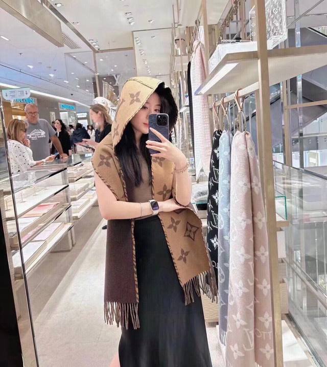 Fall For You Hooded ScarfThe Fall For You Hooded Scarf is crafted from a rich pl