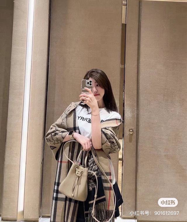 Burberry's popular Warhorse Knight double-sided cape, hailed as Burberry's most