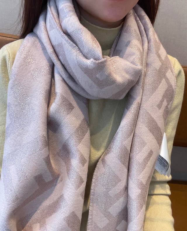 Fendi's new Double F tassel cashmere scarf features an extremely comfortable, lo