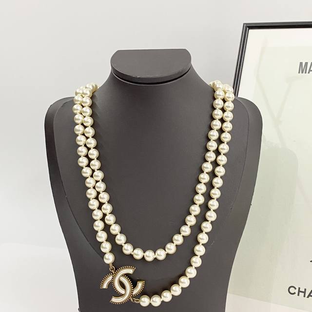 Chanel's hot-selling necklace, the Chan 24 Vintage Enamel Double C Pearl Sweate