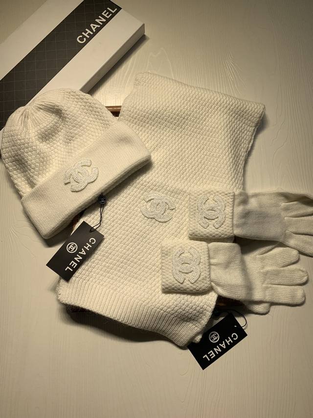 C. A classic three-piece wool suit with hat, scarf, and gloves! Material: 70% wo