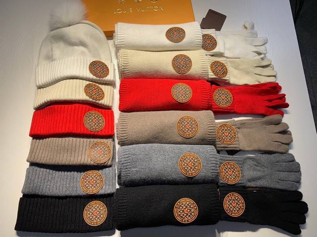 L. A classic three-piece wool hat set featuring hats, scarves, and gloves! Warm