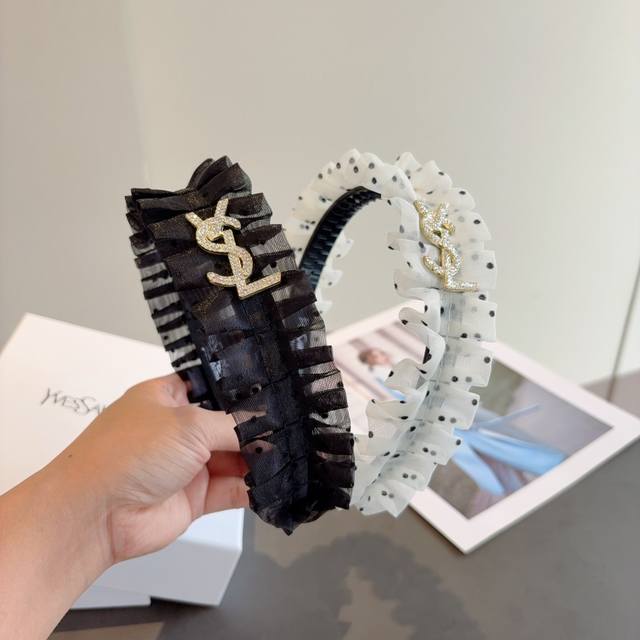with packaging Yves Saint Laurent's new trendy high-end pleated headband, simpl