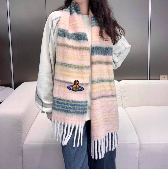 Classic large Saturn mohair scarf by Vivienne Westwood, the British fashion des