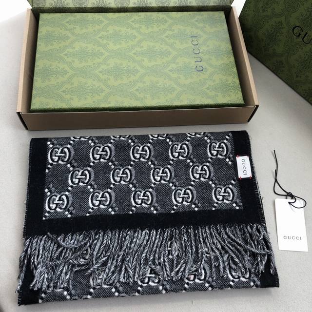 Gg Jacquard Scarf 194*34cm 100% Wool This soft jacquard wool scarf is decorated