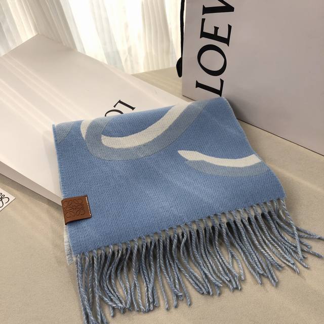 Loewe large-print medium-weight wool and cashmere blend scarf. This scarf featu
