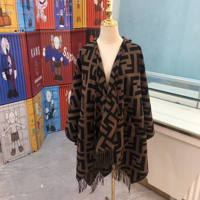 Available now at the official store! This limited-edition Fendi hooded cape and