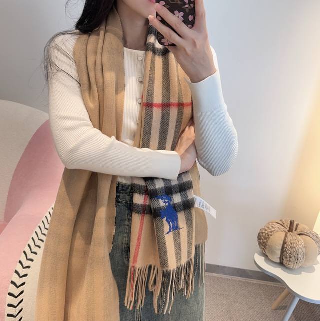 Burberry's classic plaid is a timeless style. This BBR warhorse embroidered clas