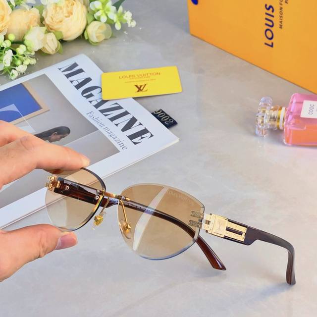 Louis Vuitto* oval frameless trimmed sunglasses hot girl street shot concave sha