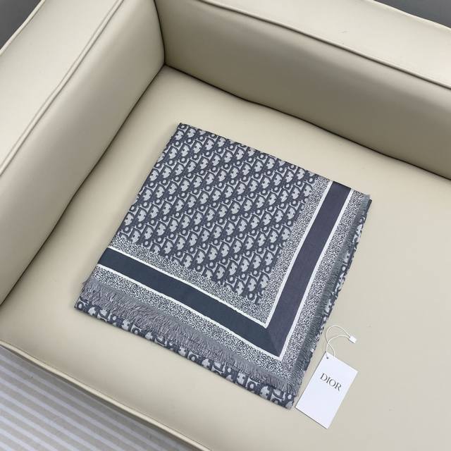 The Dior shawl square scarf features classic monogram prints paired with a silk