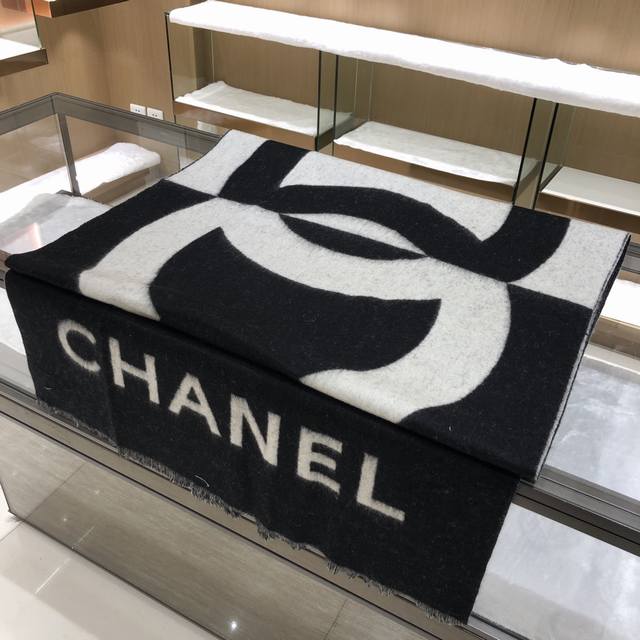 This is a new, last-minute Chanel colorblock cashmere shawl, direct from Europe