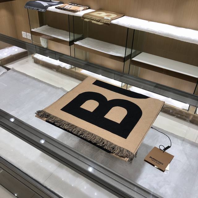 Everyone recommends one!!! Burberry's latest double-sided scarf with large lett