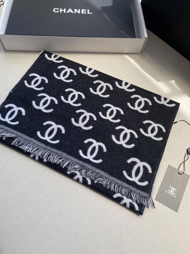 Chanel's new double-sided scarf is made of an extremely soft wool and cashmere b