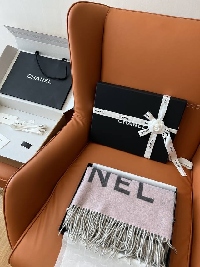 A timeless classic scarf that can last a lifetime. Chanel Cashmere Double-Sided